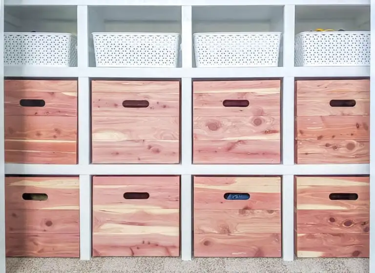 Stackable wood storage cubes neatly organized in a modern living room, holding books, decor, and toys for a clutter-free space.