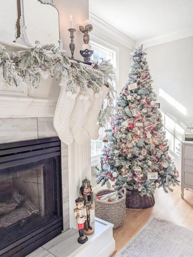 A cozy Christmas home scene featuring a warmly lit living room with a decorated Christmas tree, soft blankets, and glowing candles, creating a festive and inviting atmosphere.